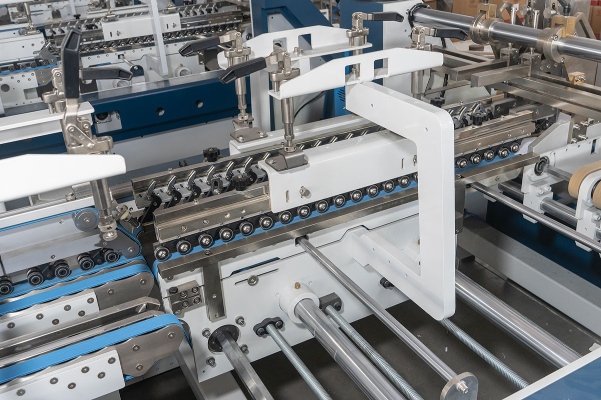Comment fonctionne une colleuse de dossiers : guide étape par étape de sa structure et de son fonctionnement