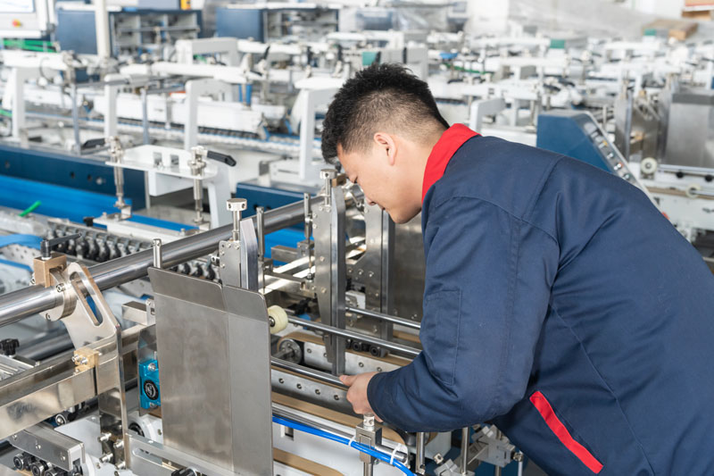 Optimisation de la vitesse de production dans les lignes de traitement de cartons