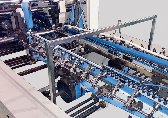 Une machine à coller pliante de carton est-elle la clé d'une production d'emballages plus propre et plus cohérente